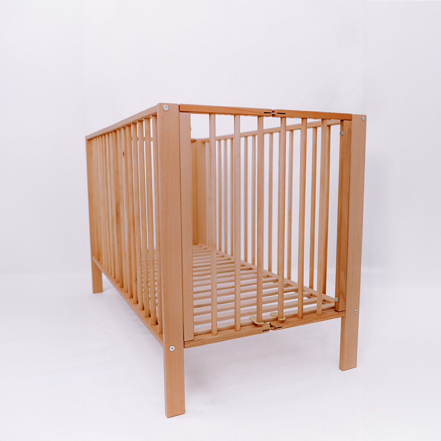Folding Wooden Cot Natural (Wheels Included)