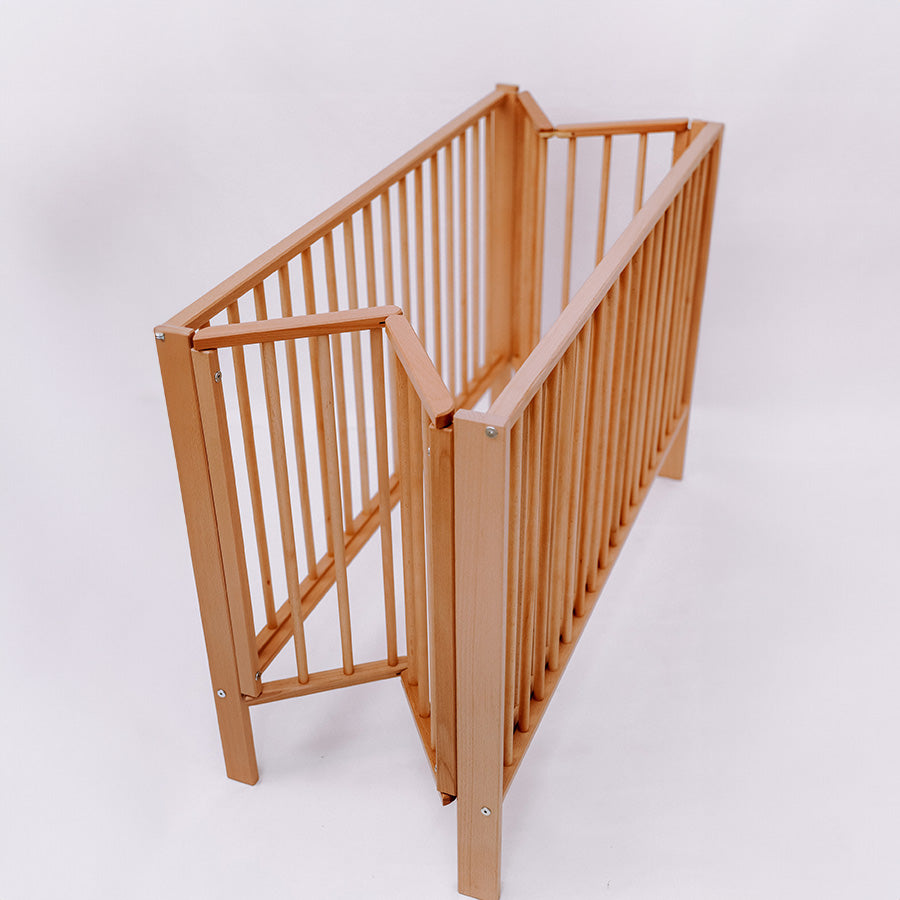 Folding Wooden Cot Natural (Wheels Included)