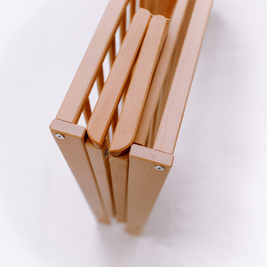 Folding Wooden Cot Natural (Wheels Included)